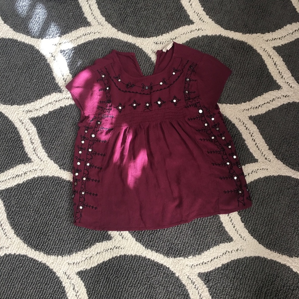 Bohemian style top with mirror-like accents